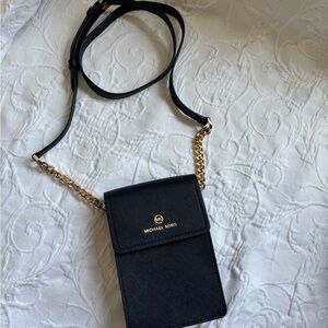 Michael Kors Black MK leather jet black and Gold Mini Crossbody